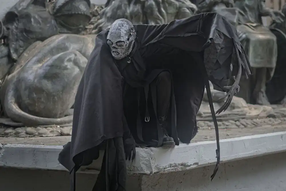 Dark fantasy character staring into a cosmic portal in a dungeon