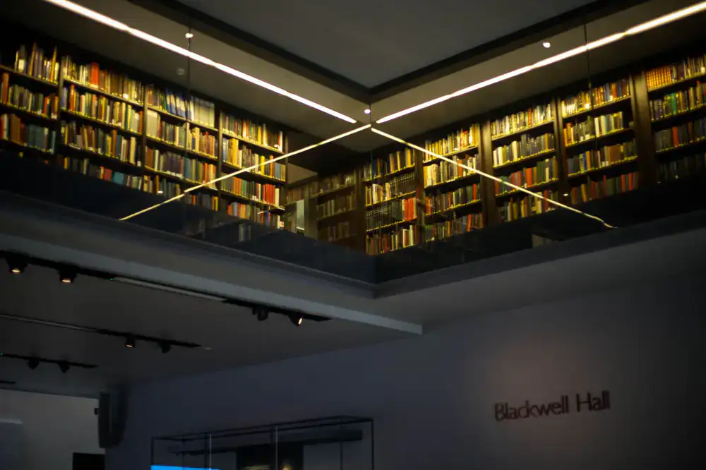 A guild hall library representing the player support center
